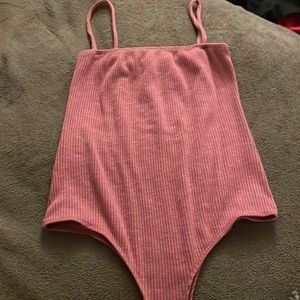 Super cute pink body suit
